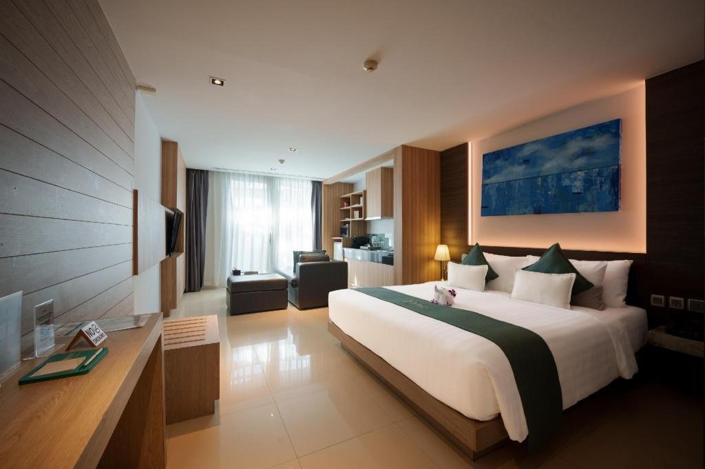 Kudo Hotel & Beach Club：尊贵豪华房卧室