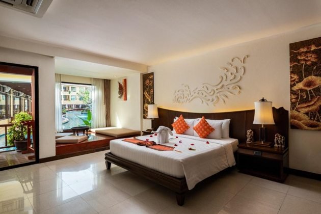 Patong Paragon Resort & Spa：豪华泳池直达房卧室